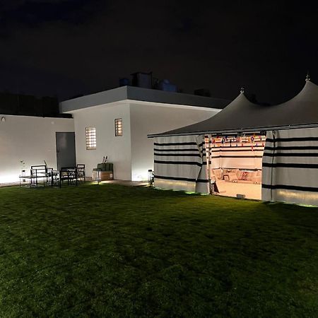 Garden Land Aparthotel คามิสมูชาอิท ภายนอก รูปภาพ