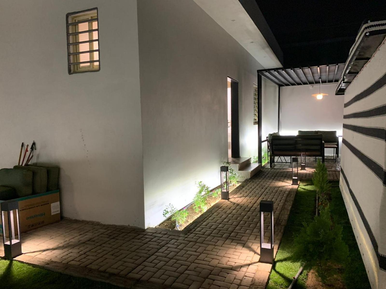 Garden Land Aparthotel คามิสมูชาอิท ภายนอก รูปภาพ